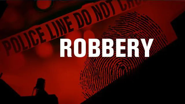 A red background with the word robbery written in white.