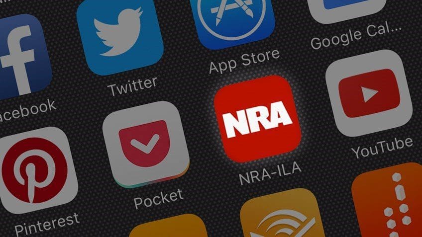 A close up of the nra logo on an iphone